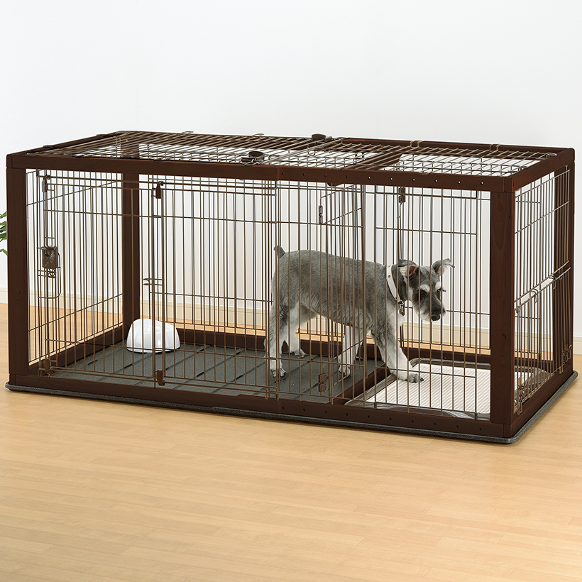 dog crate with bathroom area