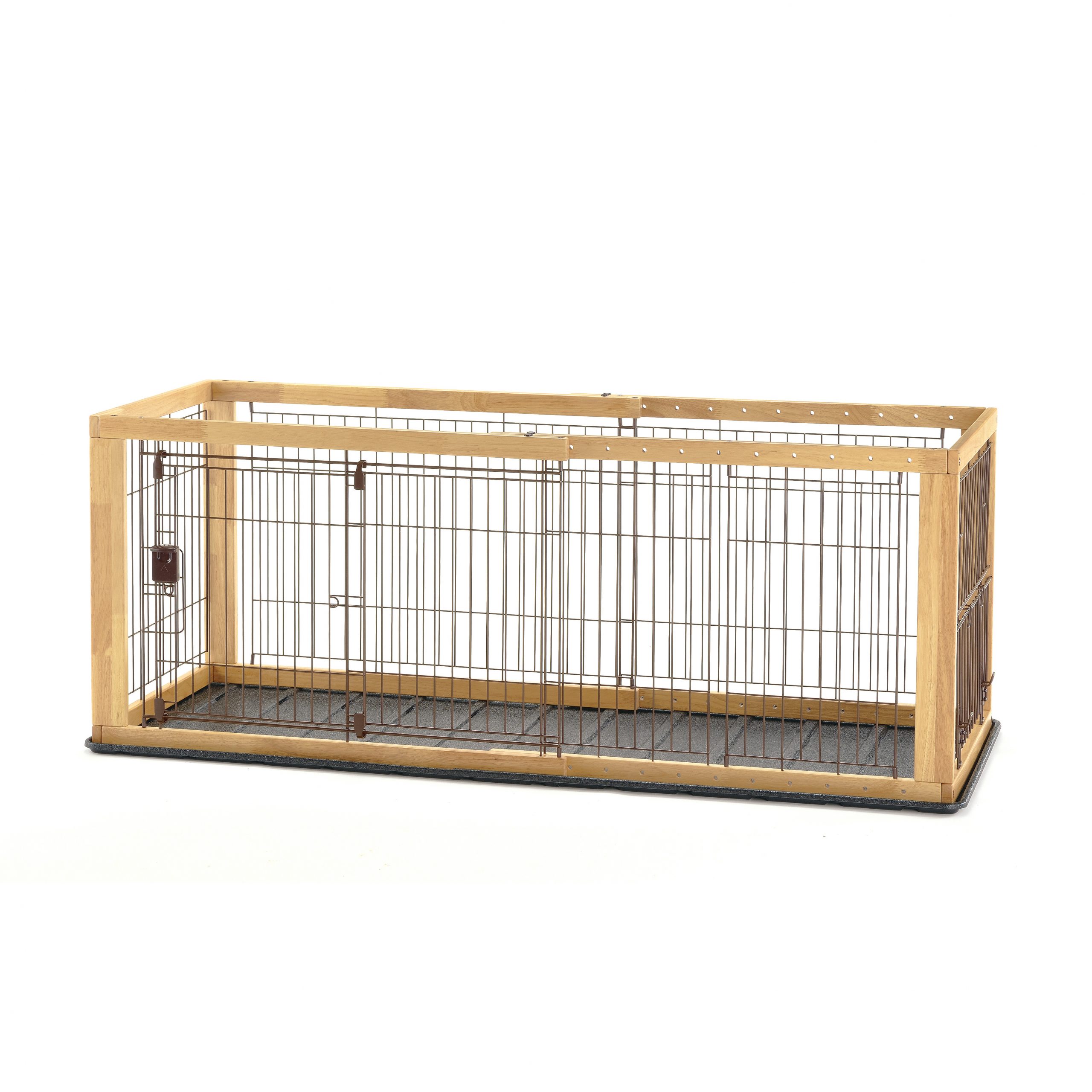 dog crate with bathroom area