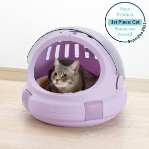 Cat inside hooded purple cat bed