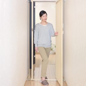 Woman using Cat Safety Gate